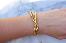 Load image into Gallery viewer, Triple Gold Beaded Bracelet
